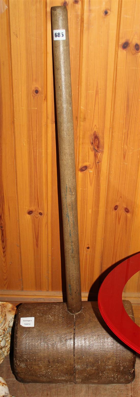 A large wooden mallet